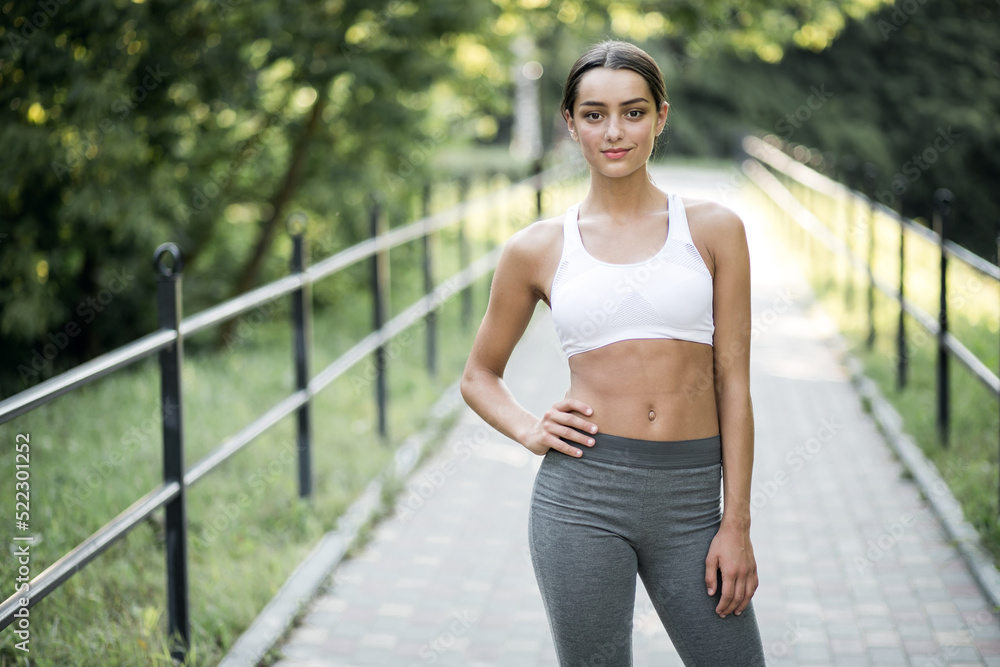 Woman in park having morning jogging