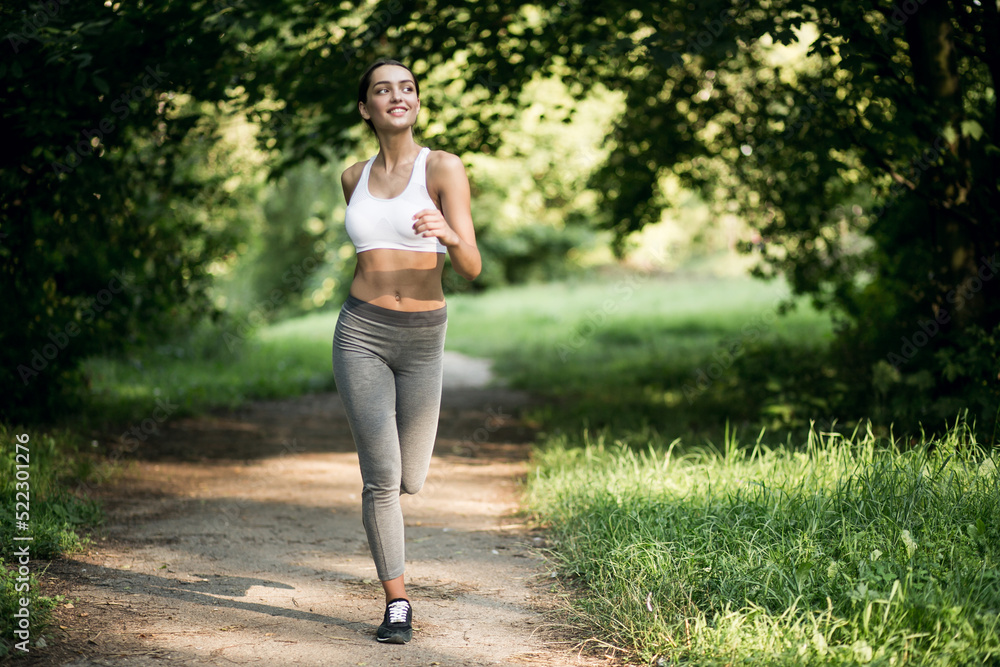 Young woman running in the park