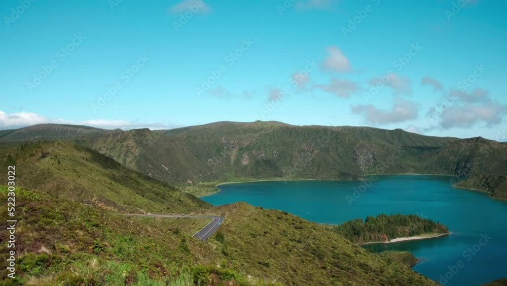 Scene low angle view from a trail to discover the view of the Fire Lake (Lagoa do Fogo) on the island of São Miguel in the Azores, Portugal, Europe. Scene low angle view from a trail to discover the view of the Fire Lake (Lagoa do Fogo) on the island of São Miguel in the Azores, Portugal, Europe.
