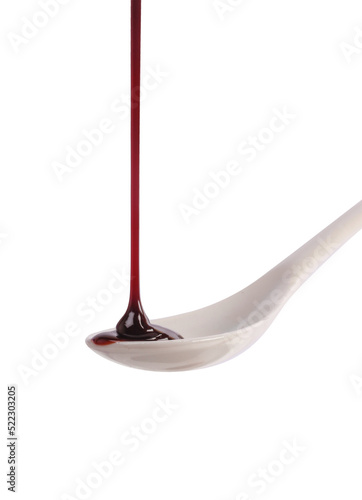 Chocolate dripping from the top on white background.