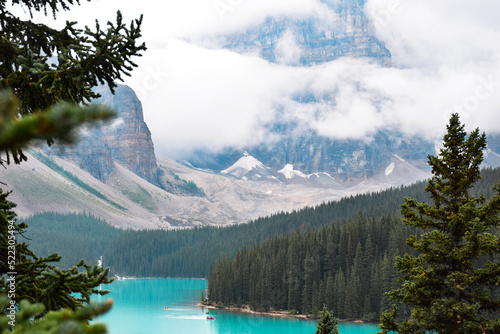 Landscape view of turquoise blue lake surrounded by mountains