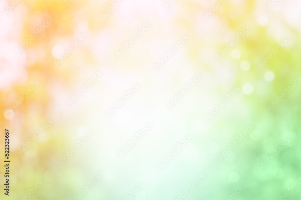 Abstract autumn background with bokeh. Gradient orange and green blurred natural background