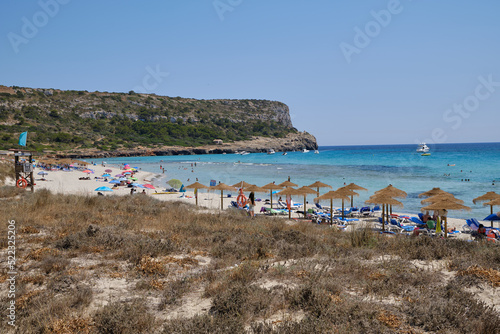 Menorca, Spain: Afternoon in Son Bou beach on a cold sunny day, Menorca, Spain