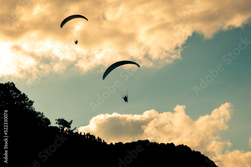 At sunset
paragliders paragliding. Kapıkaya, located in Samsun's Bafra district. photo