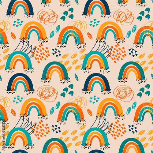 Childish seamless pattern with hand drawn rainbow and doodle elements. Trendy...