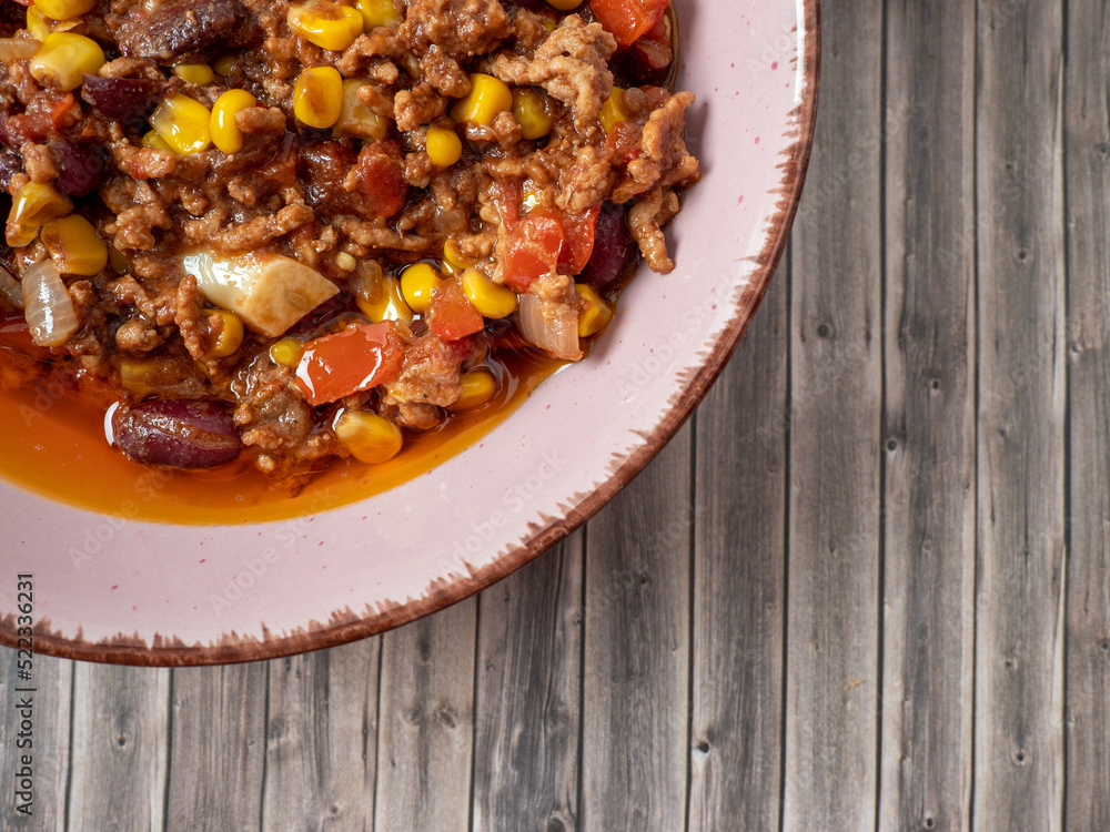 Chili con carne, a traditional Mexican dish with beef and beans. Chili con carne, a traditional Mexican dish with beef and beans.