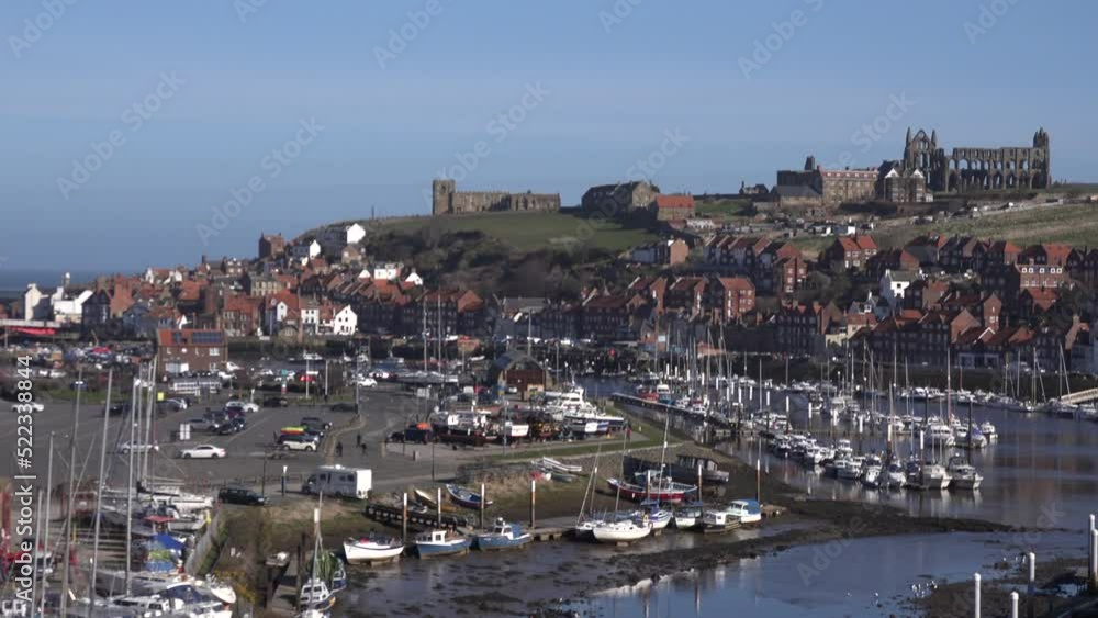 Whitby harbour a tourist hotspot in the North of England aerial of town UK 4K