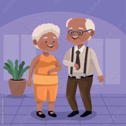 afro grandparents couple and houseplant