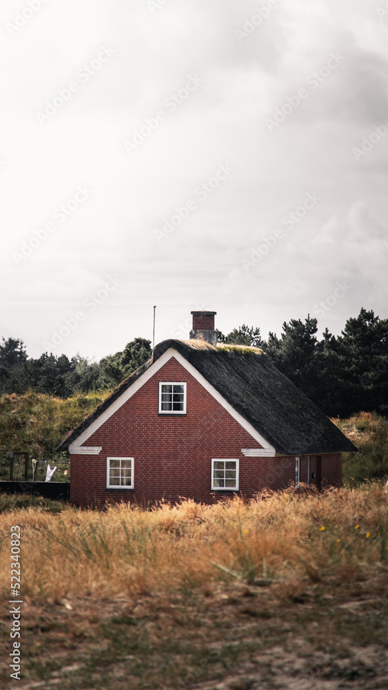 Red Danish house in Fanø island countryside Red Danish house in Fanø island countryside