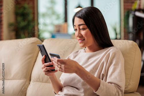 Free Download Asian woman buying online doing shopping using credit card on phone, smartphone credit happy female pay internet web purchase payment money customer asia app payment - GFXLoad