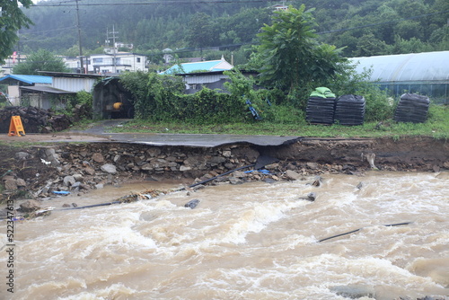 Road destroyed by flood and localized torrential downpours