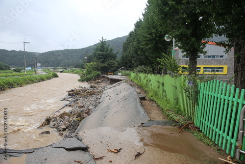 Road destroyed by flood and localized torrential downpours