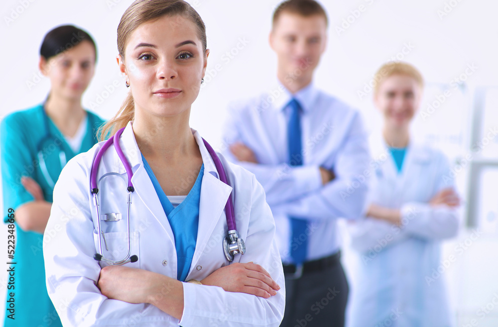 Woman doctor standing with stethoscope at hospital Woman doctor standing with stethoscope at hospital