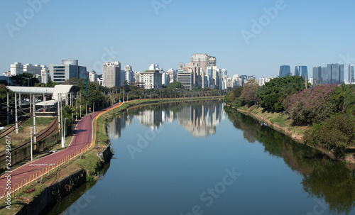 Rio Pinheiros (Pinheiros River), Marginal Pinheiros bike path and buildings reflected in water - Prédios refletidos no Rio Pinheiros
