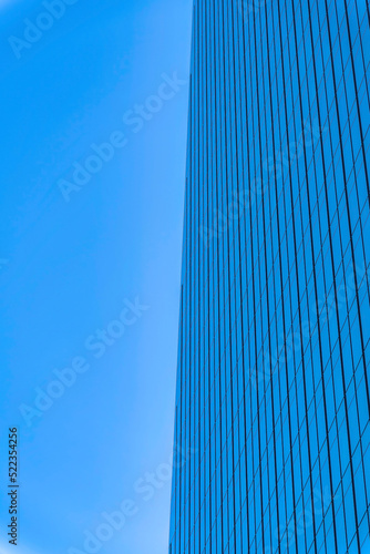 Skyscraper building with a reflection of the sky on its glass walls- Austin, Texas