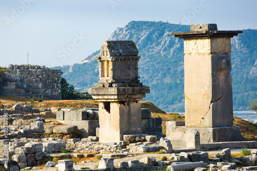 Ruins of ancient Lycian city of Xanthos with remained impressive monumental tombs, Kinik, Antalya Province, Turkey photo