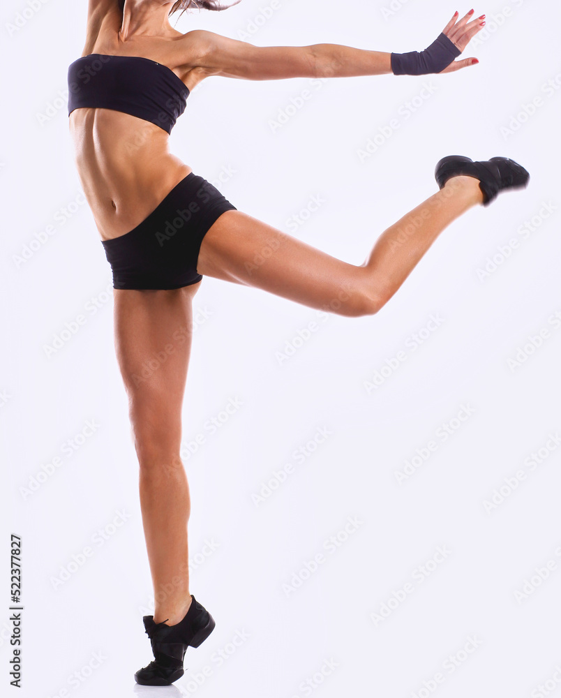 Stylish and young modern style dancer jumping Stylish and young modern style dancer jumping