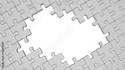 Assembling and disassembling puzzle. Assembling and disassembling puzzle elements on white background. Cycle, seamless video. Footage video