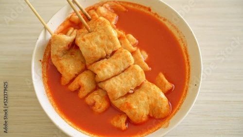 Odeng - Korean fish cake skewer in Korean spicy soup - Korean street food style photo