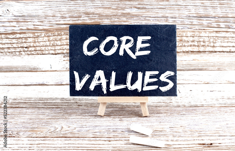 CORE VALUES text on the Miniature chalkboard on wooden background