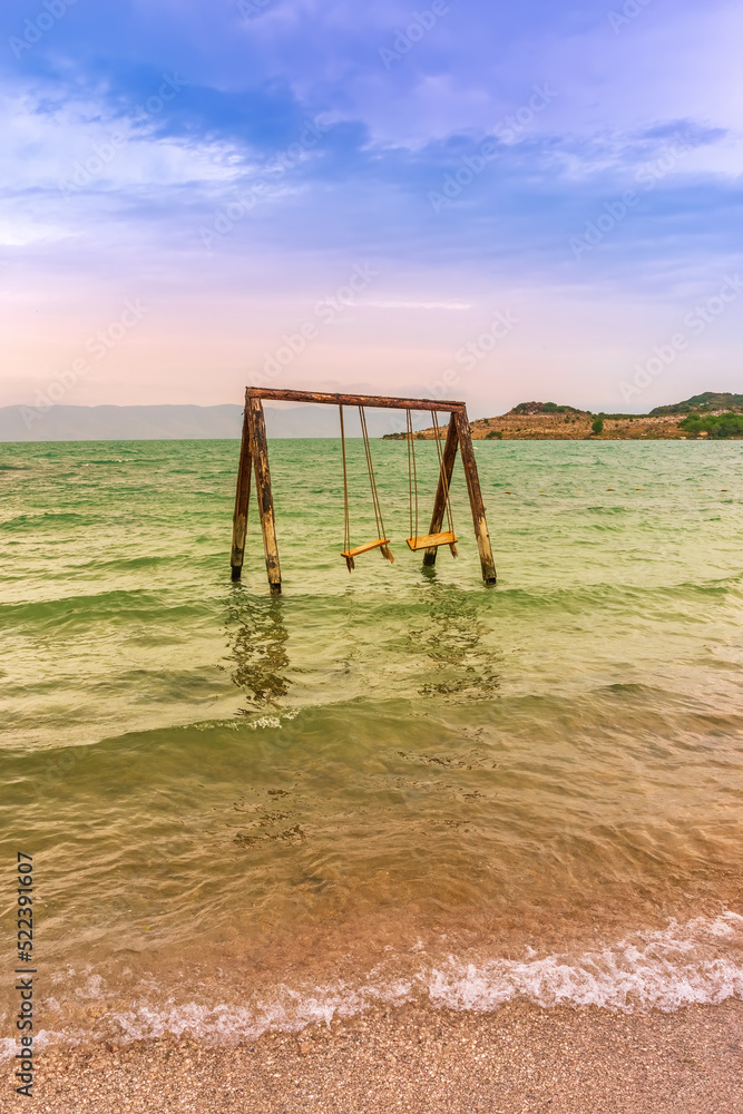 Fototapeta premium Old swings on Lake Sevan. Armenia