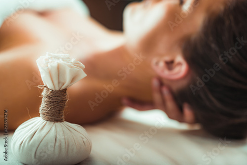 Картината върху платно Kizhi massage or herbal bolus bags Ayurveda massage, hands of an Ayurveda Massag