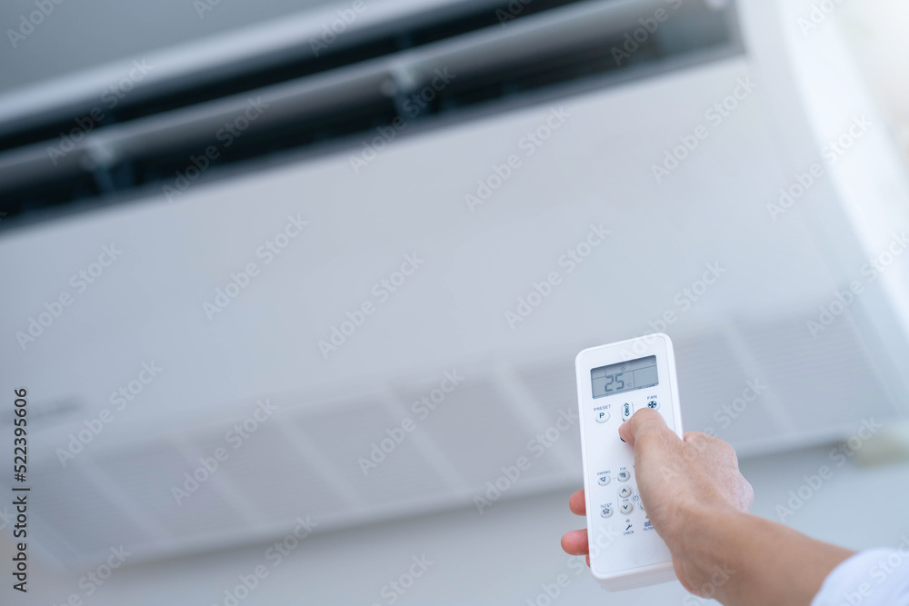 Turning on air conditioner with remote. Turning on air conditioner with remote.