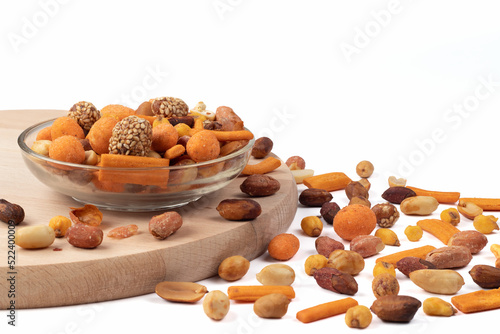 Mix of nuts isolated on bright background. Place for text. Close up view.