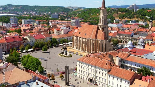 Wallpaper Mural Aerial drone view of Saint Michael Church in Cluj, Romania. Cityscape, central square, old buildings, cars Torontodigital.ca