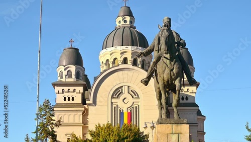 Ascension of the Lord Cathedral and Avram Iancu statue in the centre of Targu Mures, Romania photo