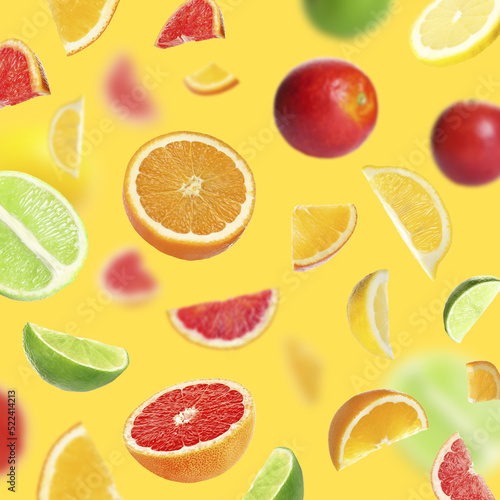 Fresh juicy citrus fruits on yellow background