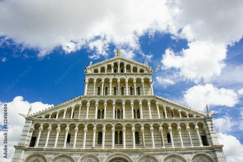 Fototapeta premium The Square of Miracles of Pisa, with the Cathedral dedicated to Santa Maria Assunta, the baptistery, and the Leaning Tower of Pisa.