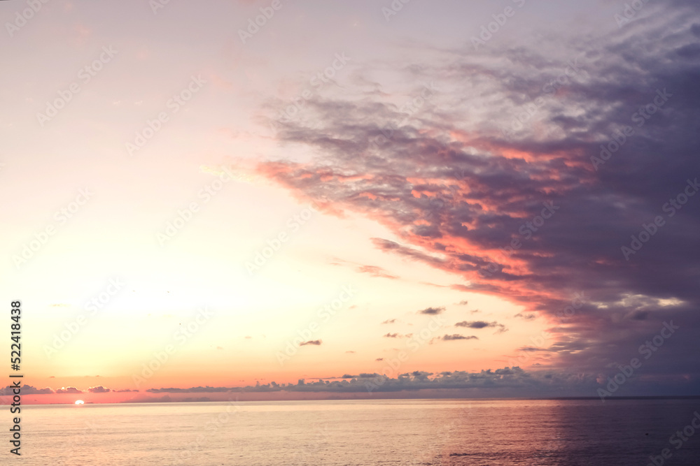 Beautiful tropical sunset. background Copy space with sun light on sky background Summer tropical background. Sunset at the Ocean Beautiful tropical sunset. background Copy space with sun light on sky background Summer tropical background. Sunset at the Ocean