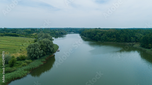 Drone aerial view pond and forest, beautiful nature landscape in summer