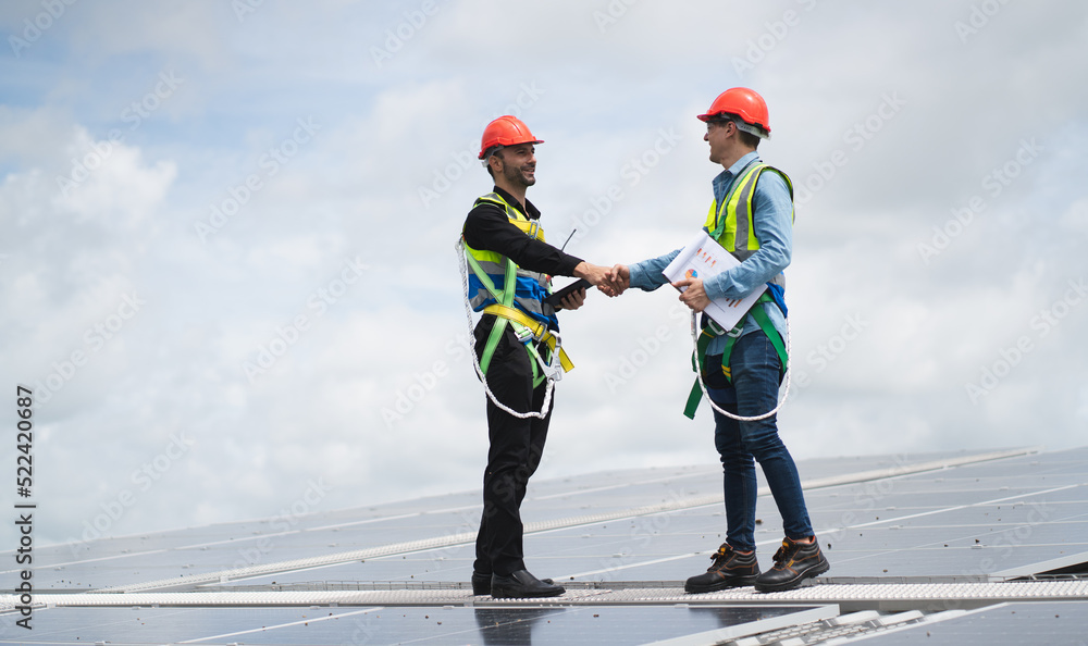 Construction workers clean solar panels for energy.Renewable Energy Battery Clean Mountain Climber Activities Work Uniforms.Managers discuss electric power ecology, human, renewable energy.
Construction workers clean solar panels for energy.Renewable Energy Battery Clean Mountain Climber Activities Work Uniforms.Managers discuss electric power ecology, human, renewable energy.