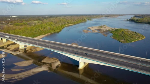 Drone 4k video of Anna Jagiellon Bridge on the River Vistula in Warsaw, Poland photo