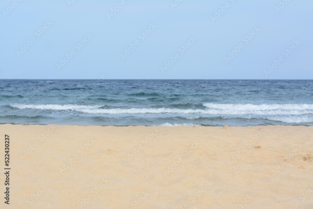 Beautiful view of sea with waves and sandy beach