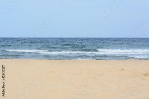 Beautiful view of sea with waves and sandy beach