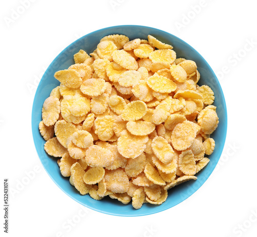 Bowl of tasty crispy corn flakes isolated on white, top view