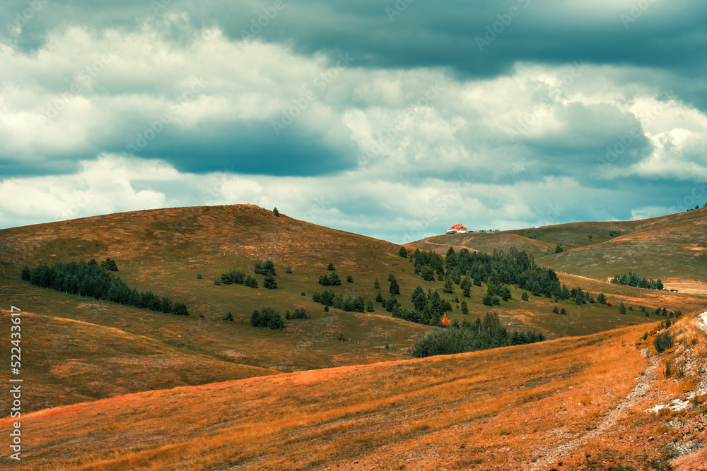 Beautiful landscape, Zlatibor hills and valley with clouds in background
