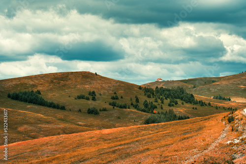 Beautiful landscape, Zlatibor hills and valley with clouds in background