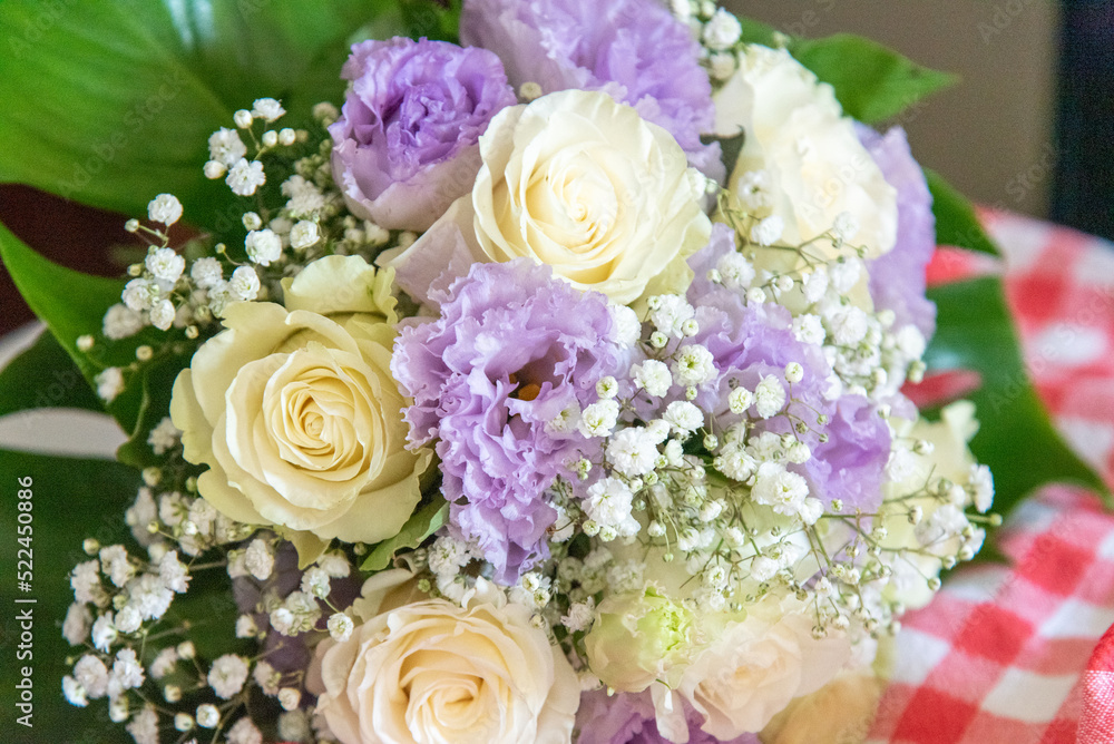 August 2022. Italy. Wedding bouquet resting on the bench August 2022. Italy. Wedding bouquet resting on the bench