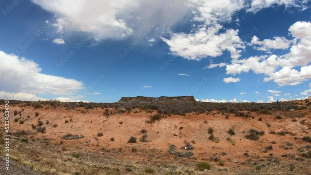 CAR SLOW MOTION - LeChee Rock is a sandstone feature located south of Lake Powell, in Coconino County of northern Arizona, USA. It is situated nine miles (14 km) east-southeast of the town of Page. CAR SLOW MOTION - LeChee Rock is a sandstone feature located south of Lake Powell, in Coconino County of northern Arizona, USA. It is situated nine miles (14 km) east-southeast of the town of Page.