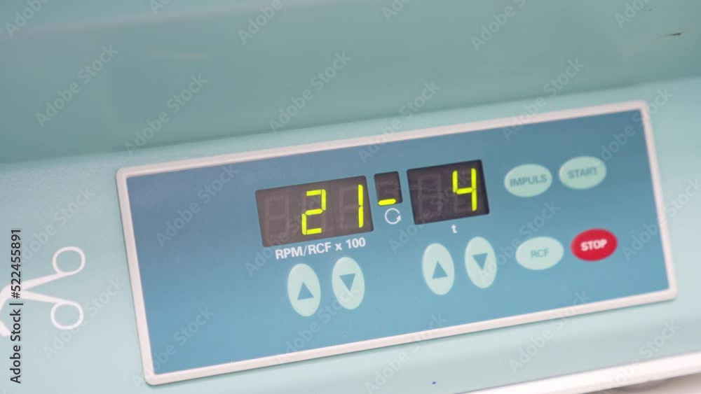 Indicator panel of a machine working in hospital laboratory. Close up. Figures changing quickly on the scoreboard.