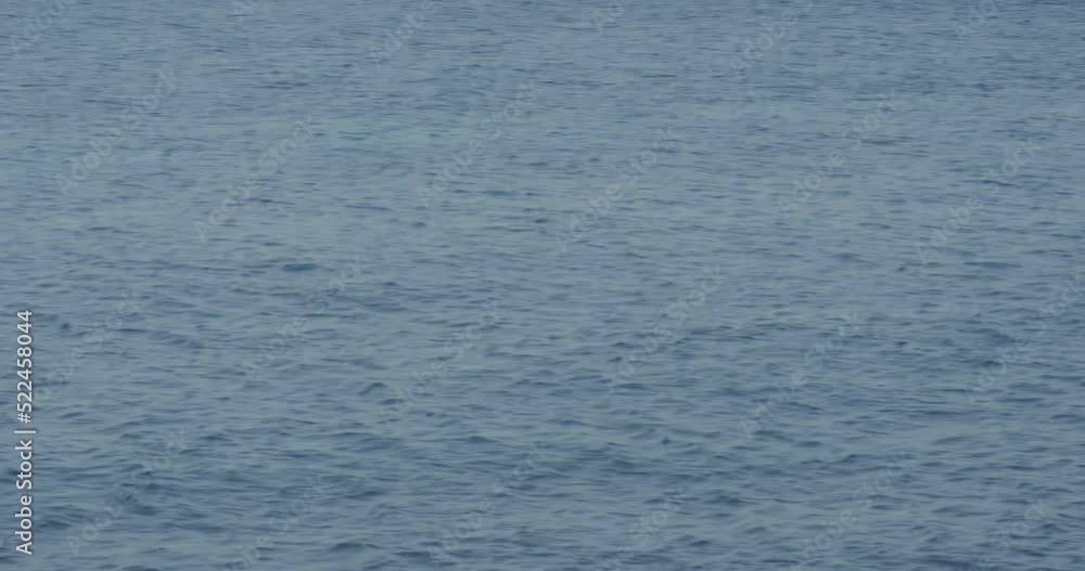Rocks, water, waves, ripples, close up, speeding boat, Mediterranean, ocean, Santorini, Greece Rocks, water, waves, ripples, close up, speeding boat, Mediterranean, ocean, Santorini, Greece