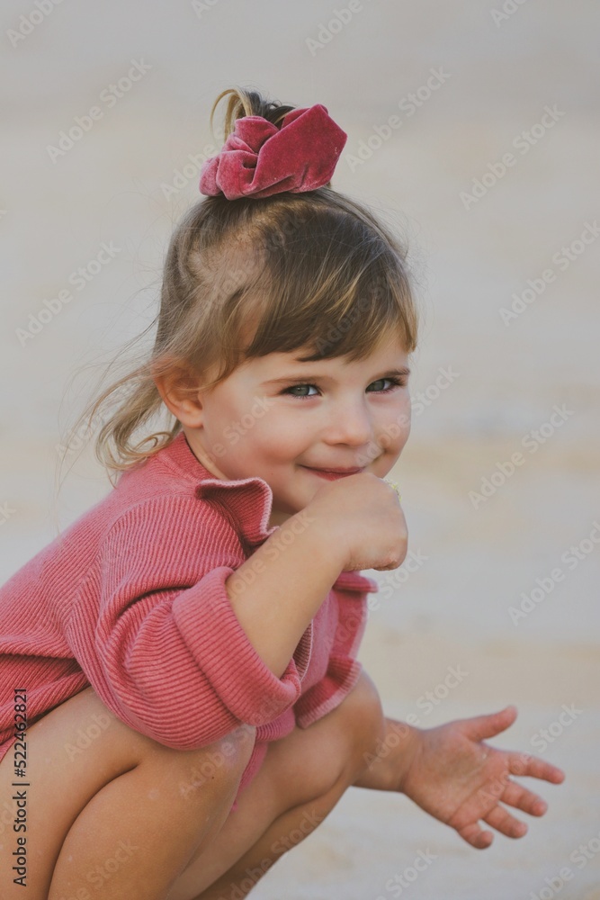 little girl on the beach in portugal peniche little girl on the beach in portugal peniche