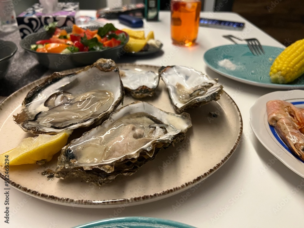 dinner with oysters with lemon dinner with oysters with lemon