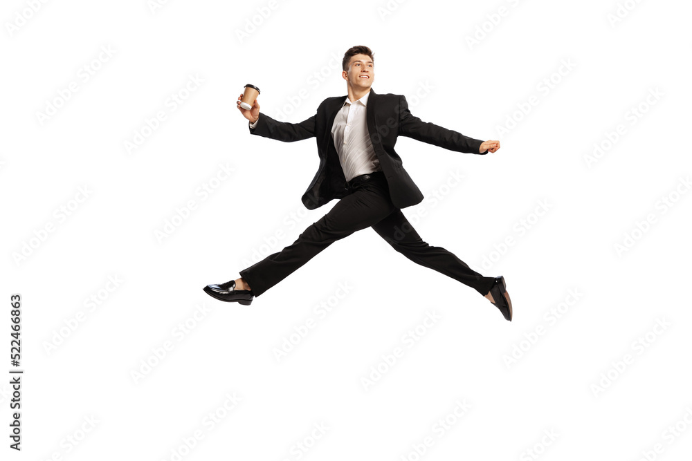 Creative portrait of young office worker in business suit in action isolated over white background. Finance, aspiration, business, job concept. Creative portrait of young office worker in business suit in action isolated over white background. Finance, aspiration, business, job concept.