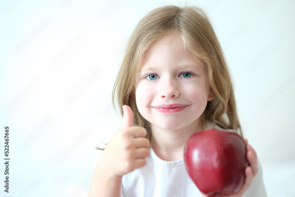 Little beautiful beautiful chooses red tasty juicy apple Little beautiful beautiful chooses red tasty juicy apple