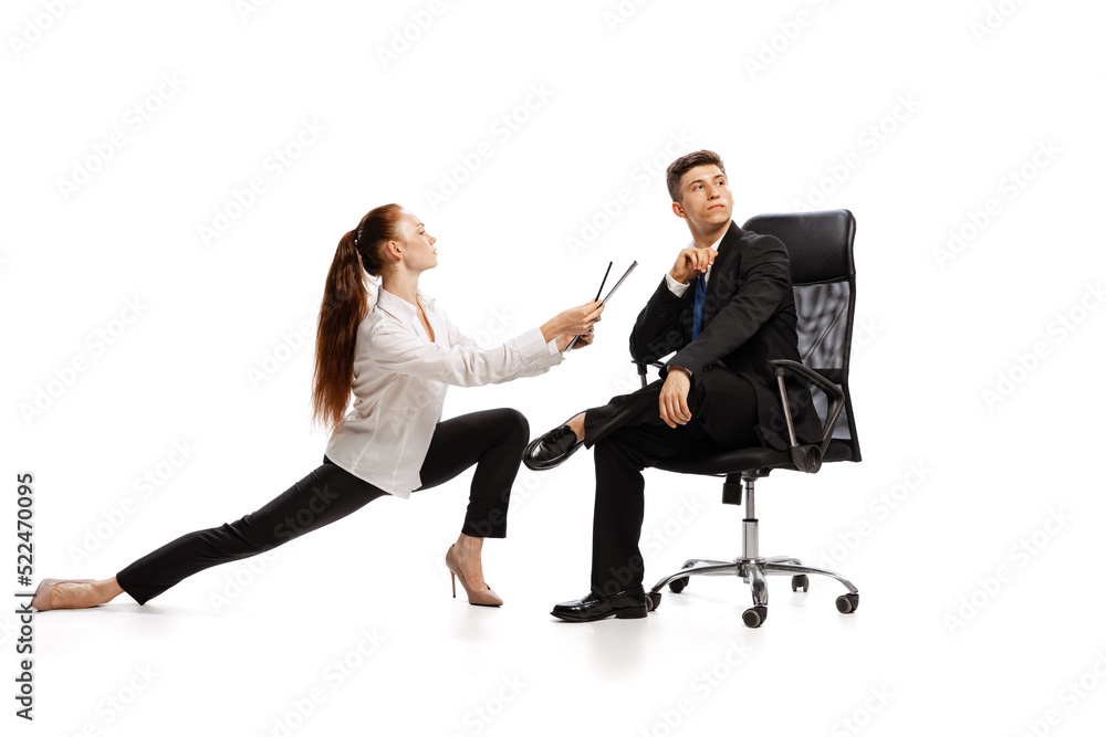 Relationship psychology. Two stylish office workers in business suits in action isolated on white background. business concept